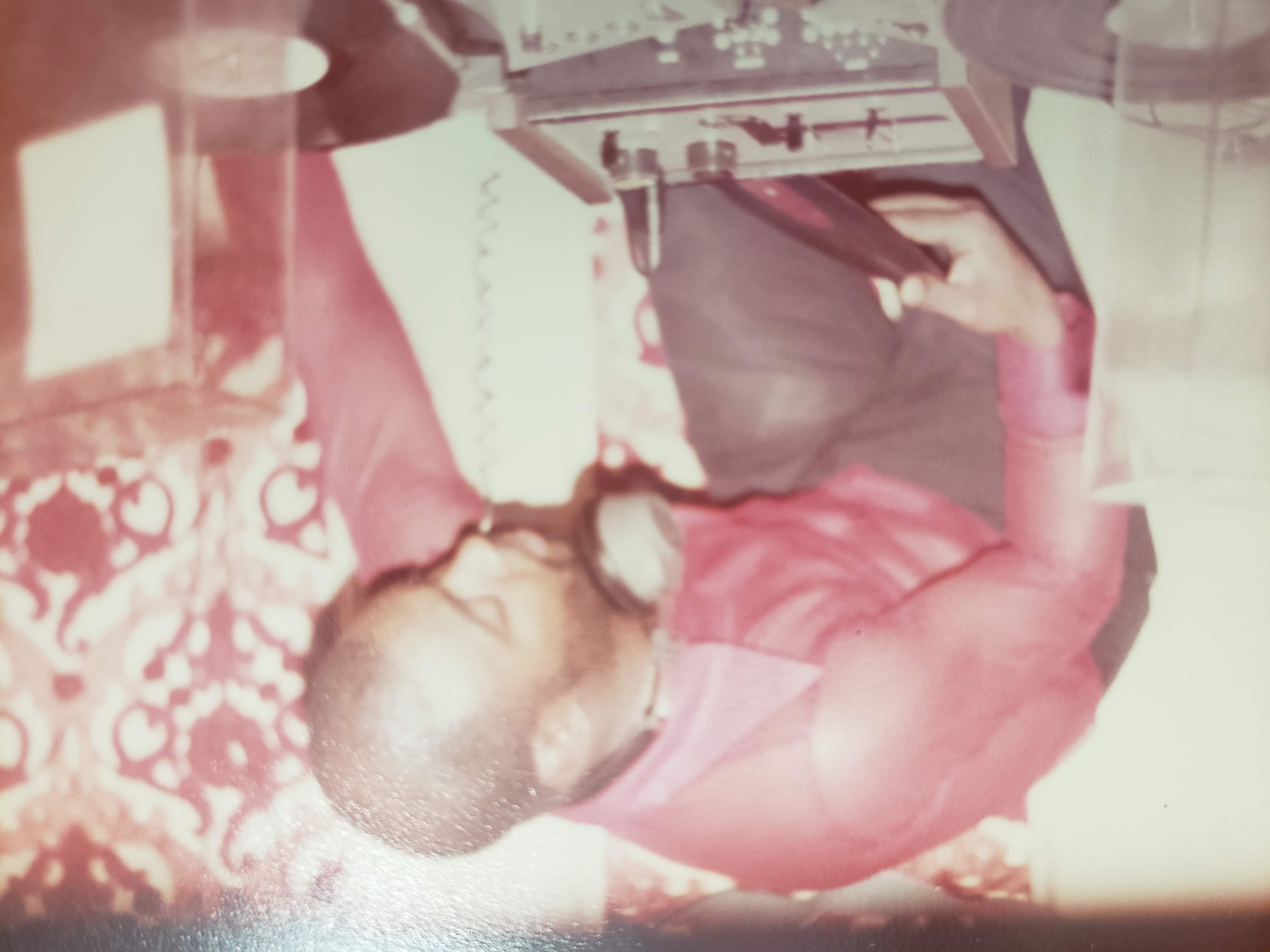 Gilbert Cassell, Gloria’s father, at DJ equipment.